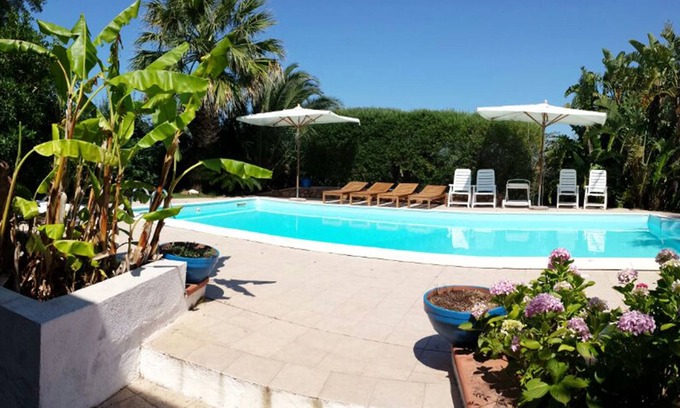Porto San Paolo Apartment | Apartment with private pool overlooking TAVOLARA