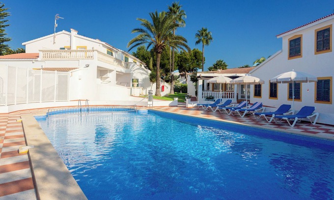 Cala'n Bosch Apartment | Apartment 'Marlena' with Shared Pool, Wi-Fi and Air Conditioning