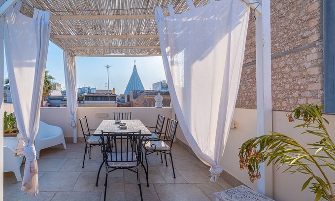 Santa Lucia Apartment | Apartment 'Mille E Una Notte - Suoni D'Acqua' with Private Terrace, Wi-Fi and Air Conditioning