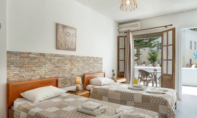 Kalymnos Town Apartment | Apartment 'Quadruple Room No 2' with Mountain View, Wi-Fi and Air Conditioning