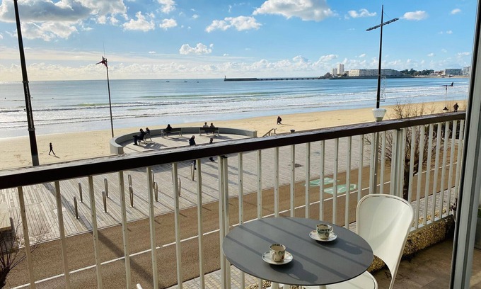 Les Sables d'Olonne Apartment | Apartment with direct beach access, balcony, and private garage
