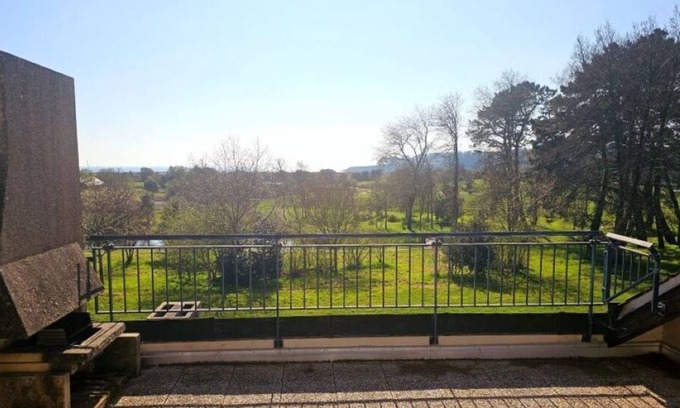 Arzon Apartment | Apartment with beautiful view over a wooded park and a large terrace