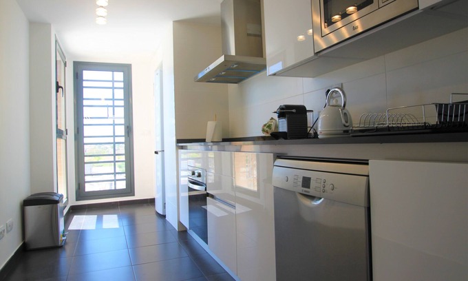 Playa de San Juan Apartment | Apartment with pool and parking in Residencial San Juan Playa