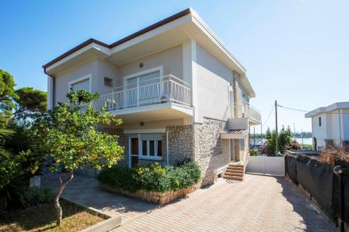Fertilia House | Appartamento 150 mq in villa sul mare a Fertilia