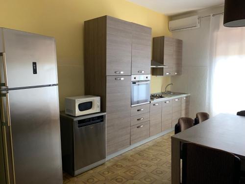 Sant'Antioco Apartment | Appartamento Vacanze sul Lungomare Amerigo Vespucci