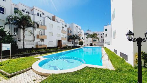 Achakkar Apartment | Appartement avec piscines, vue sur mer et accès à la plage à Achakar Hill, Tanger.