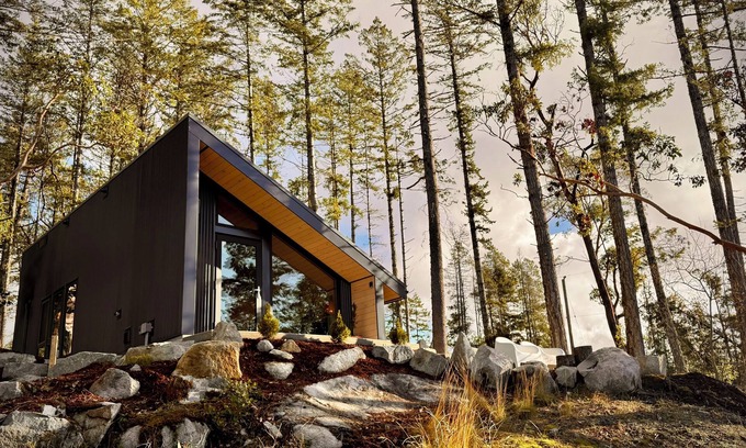 Halfmoon Bay Cabin | Arbutus Ridge, a cozy, architecturally unique cabin surrounded by arbutus trees