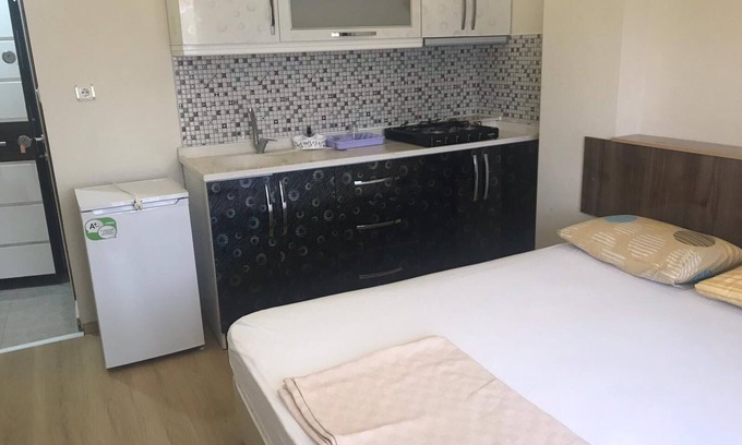 Ezine Apartment | Asya Geyikli Apart Otel