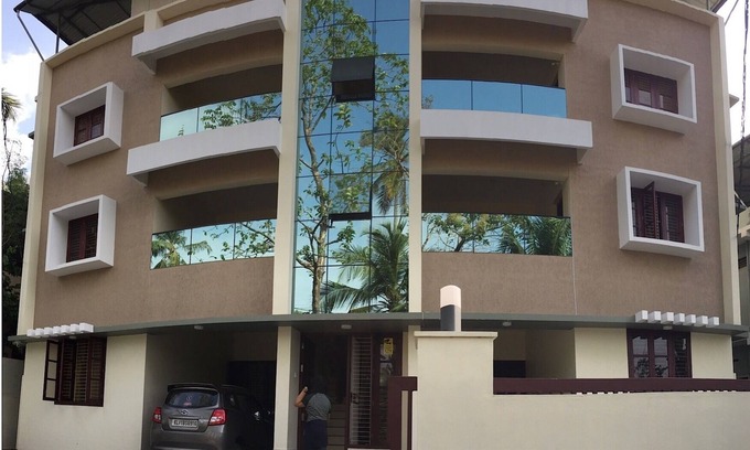 Nedumangad House | Athrakkattu Enclave 1 Bedroom Deluxe Suite