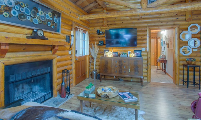 Enchanted Oaks Cabin | Authentic log cabin on Cedar Creek Lake - spectacular views from all 3 decks