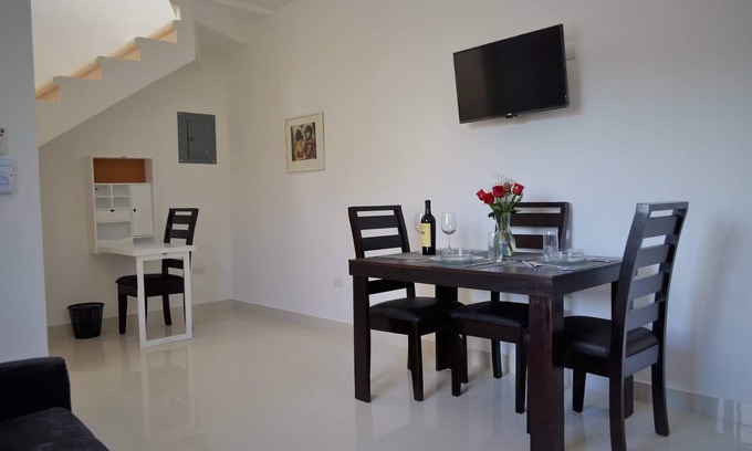 Colonia Centro Condo | Awesome Carribean Views and a Brand New Condo half block from the water!