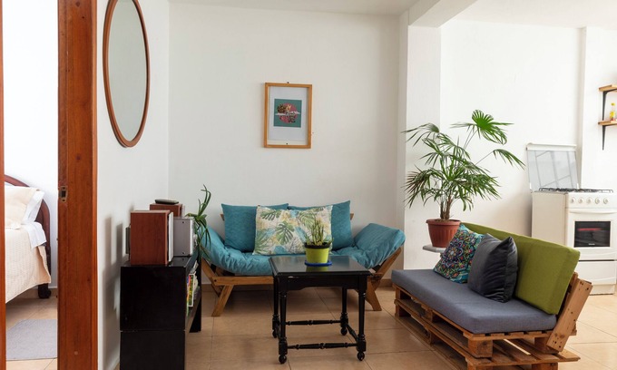 Banos de Agua Santa Apartment | Baños Downtown Comfy apartment - work area & laundry
