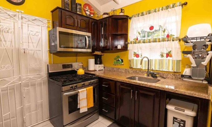 Mammee Bay House | Backyard Oasis in Drax Hall 70in TV