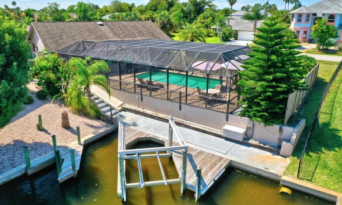 Palm Harbor House | Bahama Haven Saltwater Canal Pool Home w dock and boat lift