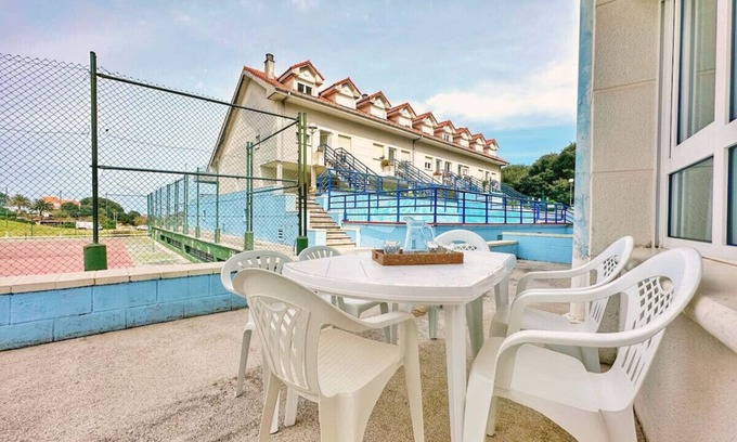 Isla Apartment | Bajo en la playa con piscina - La Arena 4203