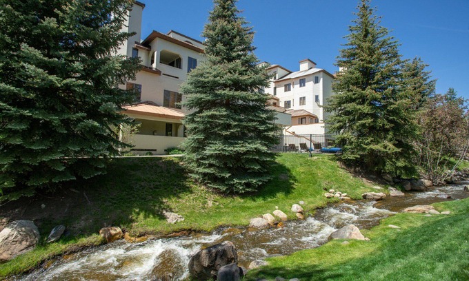 Steamboat Springs Condo | Balcony over Burgess Creek, Walk to Gondola Square, Pool, Hot Tub