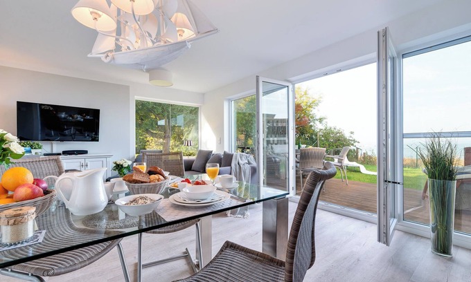 Olpenitz Apartment | Baltic Sea vacation apartment "Schleiperle" - with water view, sauna and two terraces