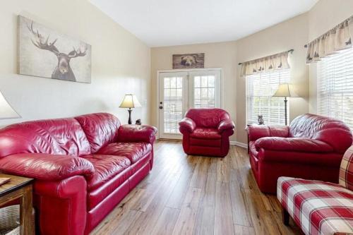 Pigeon Forge Apartment | Bandit's Riverfront Retreat - Mountain View- Condo-Fishing-Balcony-Fireplace-Great Location!