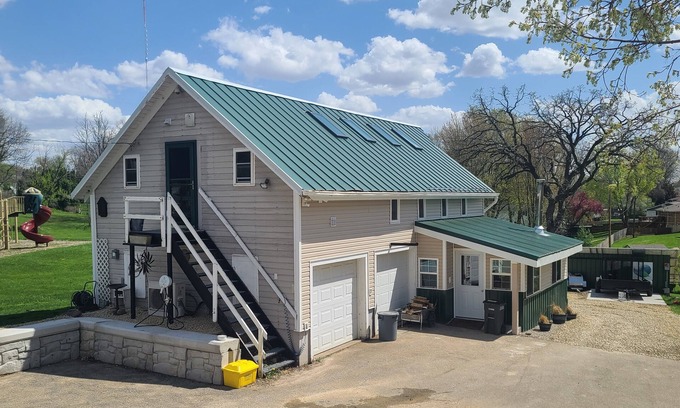Dubuque House | Barn-dominium living experience w/park view, adjustable bed, 4-seasons room