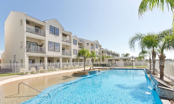 South Padre Island Condo | Bayfront Condo with Amazing Views, Waterfront Pool/Hot Tub, & Boat Slip!