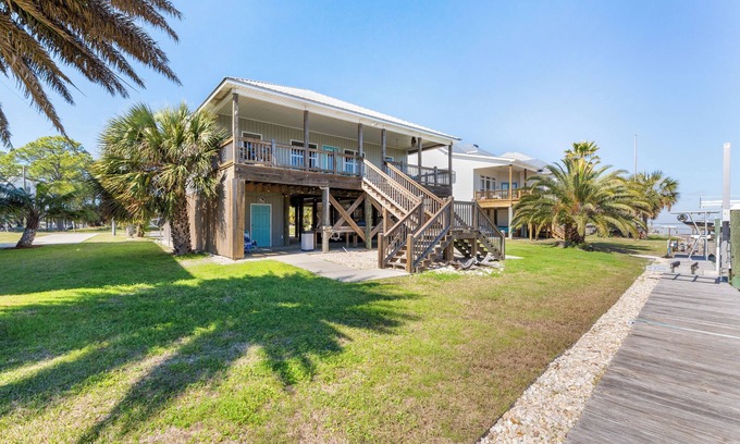 Pass Chateau Harbor House | Bayfront home with excellent view of the D.I. Bridge