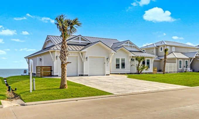 Rockport House | Bayfront water-view home with outdoor pool, lovely patio, hammock, fishing dock