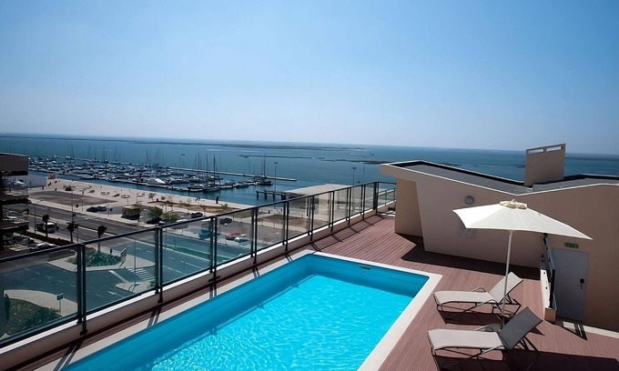 Olhao Apartment | Beach Adventure in Armona Mar Beach! Full Kitchen, Pet-friendly, Outdoor Pool!