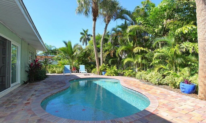 Holmes Beach House | Beach Bay Serenity: Pine Ave canal front pool home