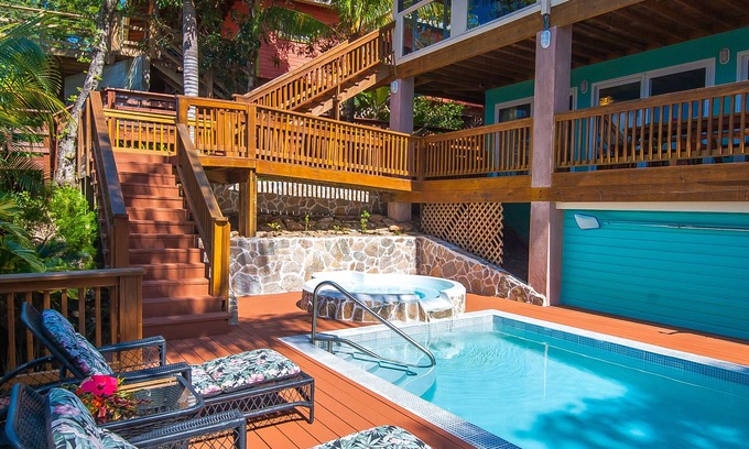 Orchid Beach Village House | BEACH front between W Bay & W End - POOL & DOCK - screen porch - Sunsets galore
