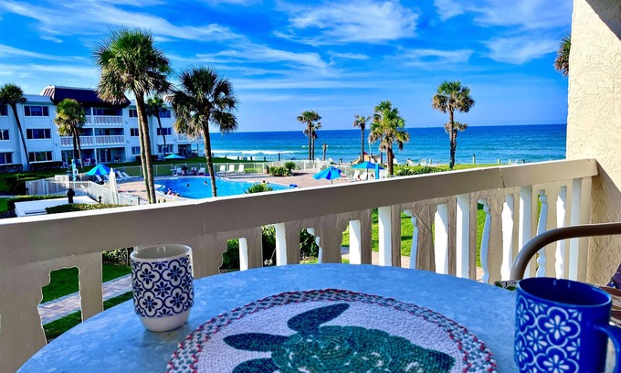 New Smyrna Beach Condo | Beach front condo with gorgeous views of the large pool and the Atlantic waves.