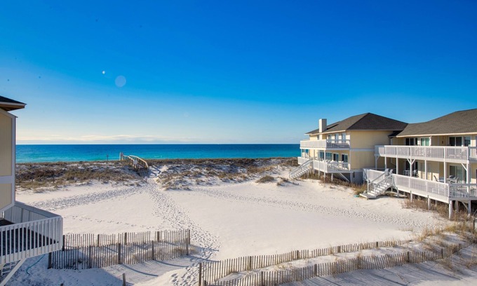 Holiday Isle Condo | Beach front - On the sand - Beautiful, renovated, clean - Sleeps 6.