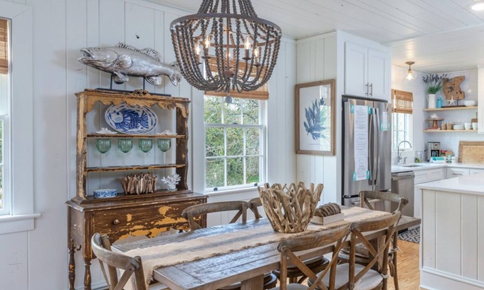 Tybee Island House | Beach Therapy: Stylish Cottage with Private Courtyard, Wrap-Around Porches, and Modern Decor.