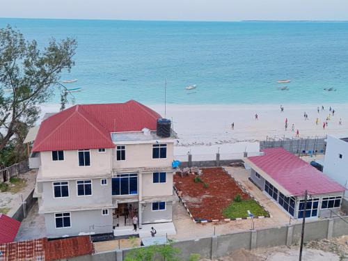 Uroa Apartment | Beachfront Bliss 2-BR Master Suites with Balcony & Free WiFi Uroa, Zanzibar