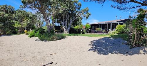 Parapara House | Beachfront Bliss - Your Parapara Seaside Retreat