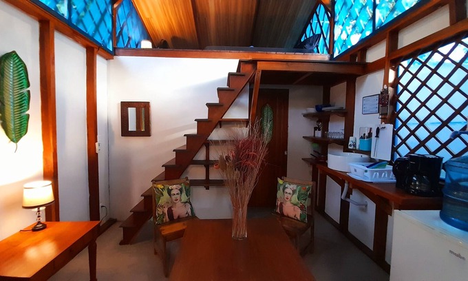Manzanillo Cabin | Beachfront Casita for 2, loft-style double bed & kitchenette with shaded porch