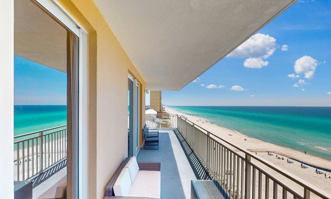 West Panama City Beach Condo | Beachfront corner condo with sweeping Gulf view, pools/hot tub & gym
