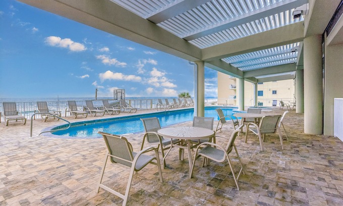Gulf Shores Condo | Beachfront condo with pool, hot tub, balcony, fitness room & amazing corner view