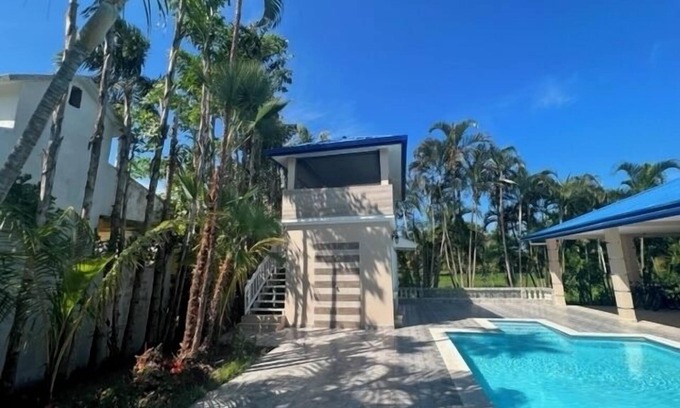 Tela House | Beachfront getaway,5 minutes from shore! Featuring a pool & recreational spaces.