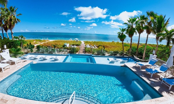 Grace Bay West Villa | BEACHFRONT! Grace Bay Beach, Sleeps 12