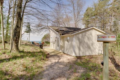 Muskegon House | Beachfront Lake Michigan Cottage Fire Pit and Deck