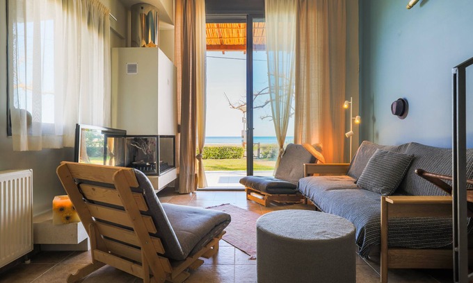 Kalamitsi Villa | Beachfront Luxury. A Modern Maisonette with Breathtaking Views in Kalamitsi.