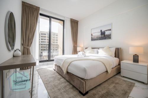 Al Hamra Village Apartment | Beachfront Luxury 1BR Sea View