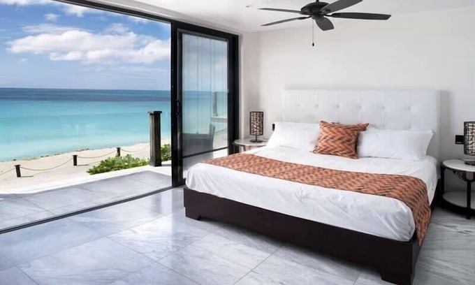 Fryes Beach Villa | Beachfront modern comber townhouse with pool at Ffryes Beach