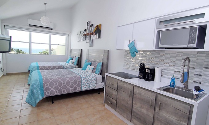 Jobos Apartment | Beachfront Modern Loft with Large Private Terrace