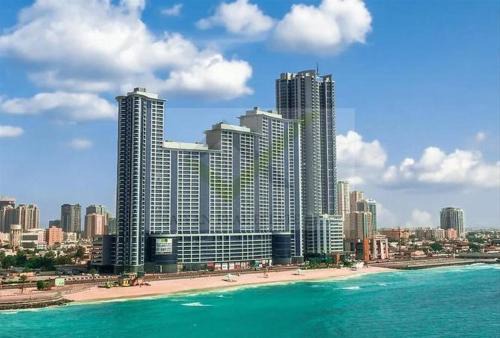 Rumailah Apartment | Beachfront Paradise - Ajman Corniche Residence