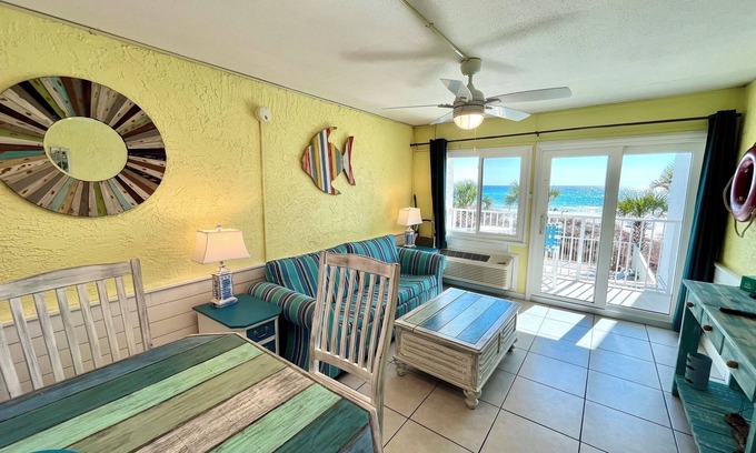 Panama City Beach Condo | Beachfront! Pool! Pet friendly! Near Pier Park! 1st floor! Beach chairs!