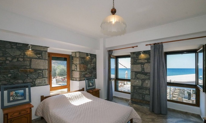 Myrina House | Beachfront Suite Deep Blue Sea Water 2