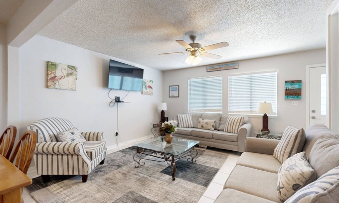Sugar Beach House | Beachfront townhome w/on-site beach access, heated pool, patio, grill, AC, W/D