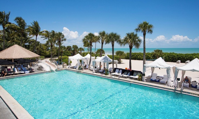 Sanibel Hotel | Beachside Escape with Garden Views, Bike Paths & Island Dining — 3 Units