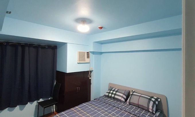Wack-Wack Greenhills Condo | Beautiful 2-bedroom condo in nice Mandaluyong with WiFi, AC, fitness room